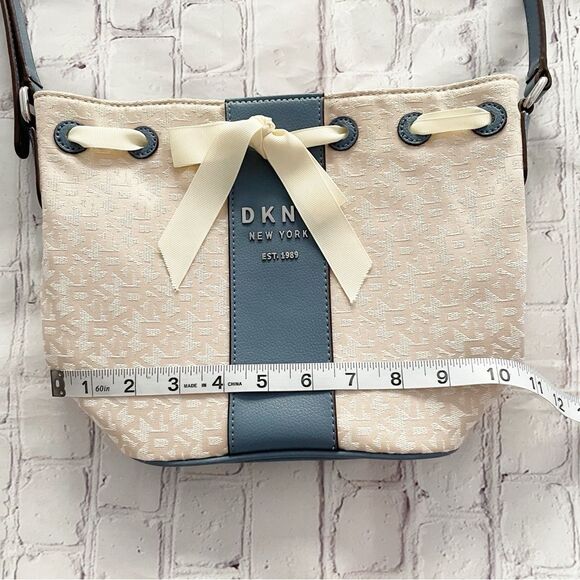 DKNY Ivory Cream and Blue Trims Lace Bow Front Bucket Style Crossbody Purse Bag - Picture 8 of 14